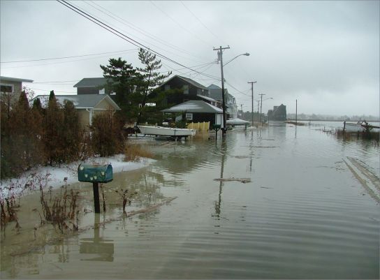 Coastal storm flooding, as experienced in Guilford, CT as a  consequence of a 2007 nor'easter, may increase in intensity as a result  of rising seas.