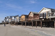 Stratford, CT, December 6, 2012--These summer cottages were not severely damaged by Hurricane Sandy due in large part to being elevated on pilings  FEMA is in the area with mitigation specialists who are knowledgeable about the value of pilings to support coastal homes. Photo by Marilee Caliendo/FEMA