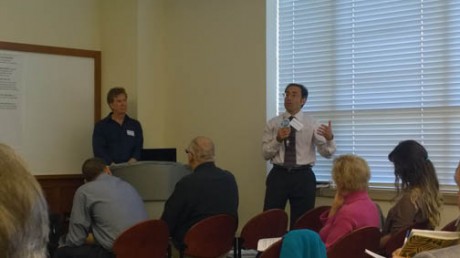 Mark Tedesco, EPA Long Island Sound Office director, discusses the CCMP with Drew Carey, a consultant. Event was at Southern Connecticut State University on Sept. 17, 2014