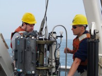 CT DEEP research assistants aboard the research vessel John Dempsey deploy a rosette sampler to collect water quality samples.Photo by Lloyd Langevin