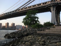 On the stairs underneath the Manhattan Bridge at mean tide. Photo by Kate Boicourt.
