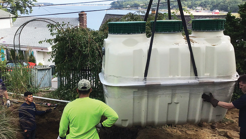 A house in Centerport Harbor gets an enhanced nitrogen removal septic system to replace a cesspool. Jim Ammerman/lisp photo