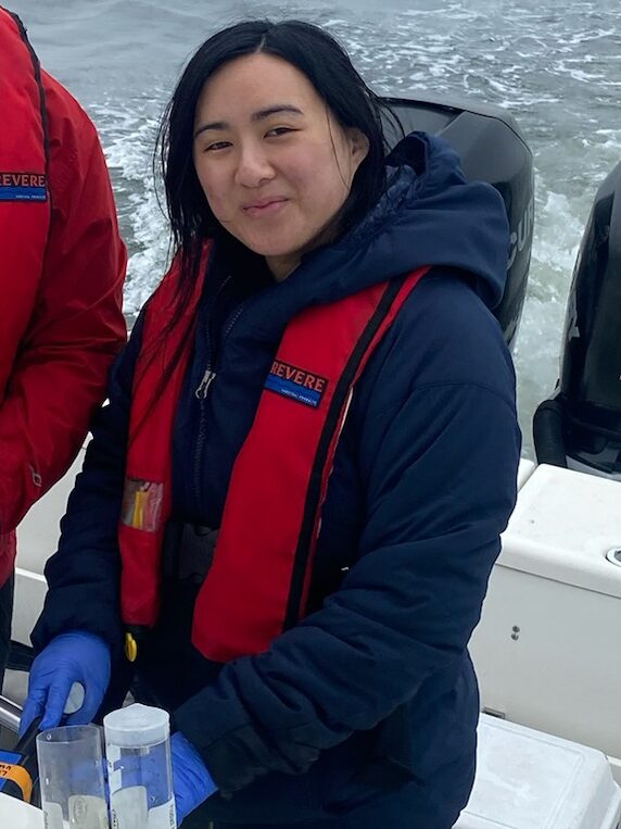 Kimarie Yap wearing a red personal flotation device.